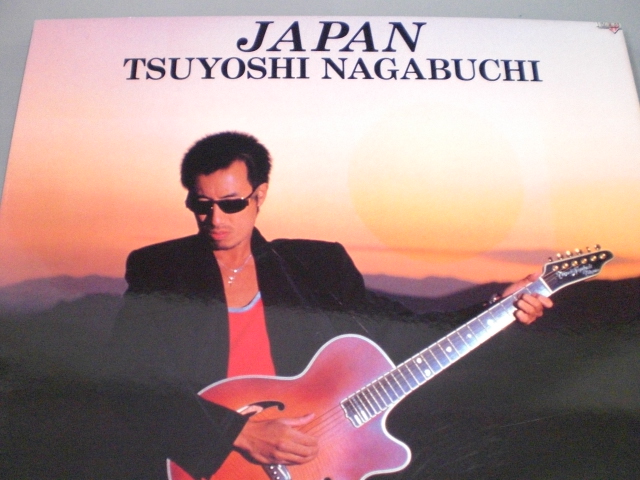 長渕剛 JAPAN TSUYOSHI NAGABUCHI パネル B2サイズのポスターを木製の